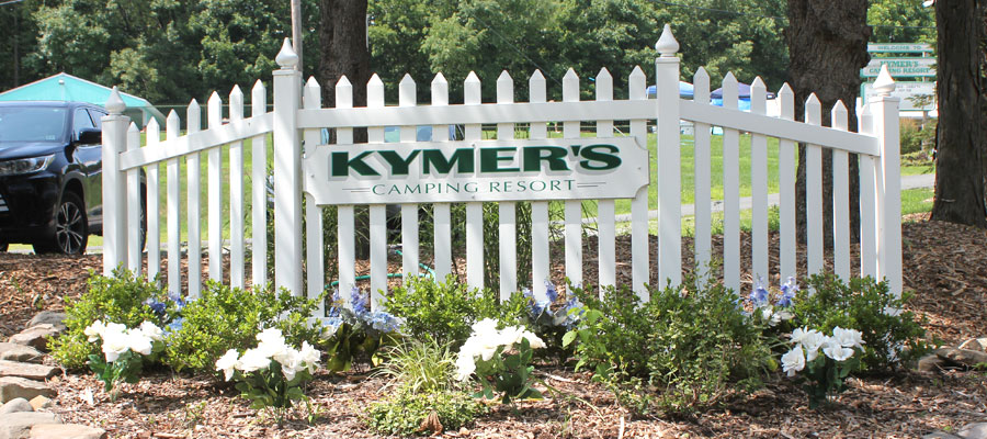 A picture of the Welcome to Kymer's sign