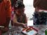 A picture of a little girl creating the perfect Christmas cookie