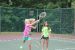 A picture of two girls enjoying tennis