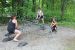 A picture of children riding the teeter totters at the playground