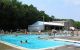 Guests relaxing in the swimming pool